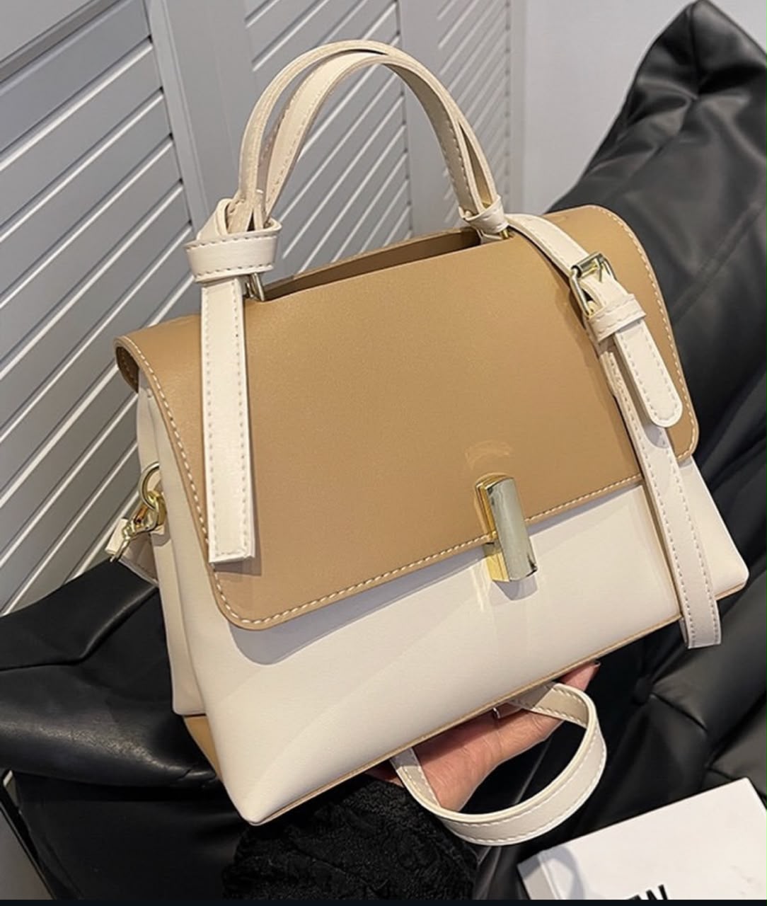 Brown and white satchel bag