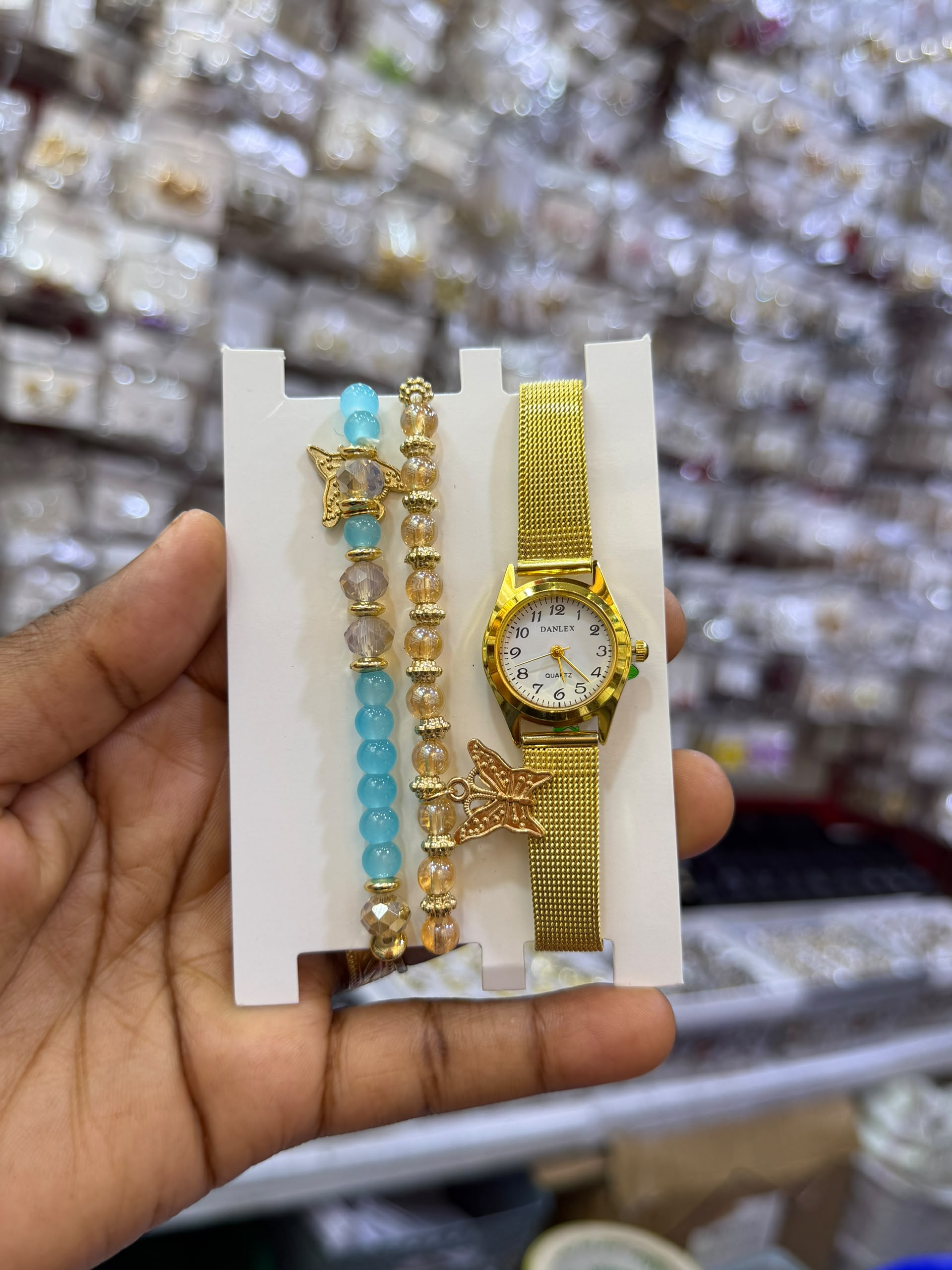 Gold Watch with Blue Bracelet